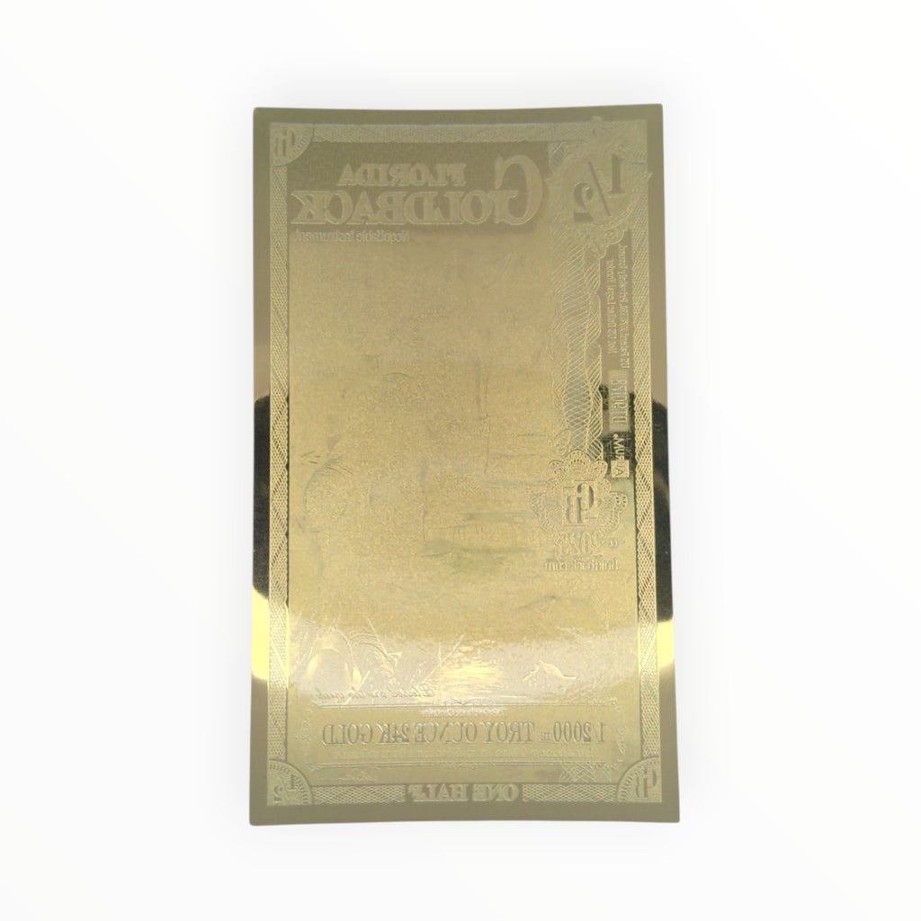 Back of a circulated ½ Alpha Florida Goldback Gold Note showing the official reverse design and security features.