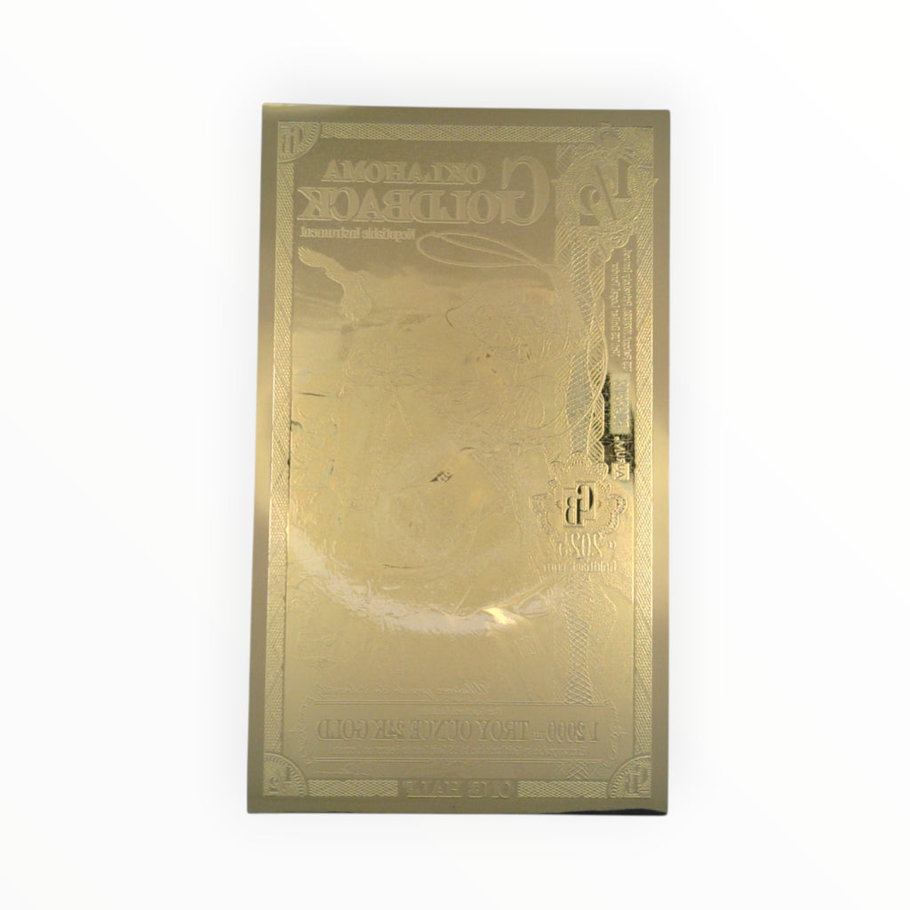 Back of a circulated 1/2 Alpha Oklahoma Goldback Note showing the official reverse design.