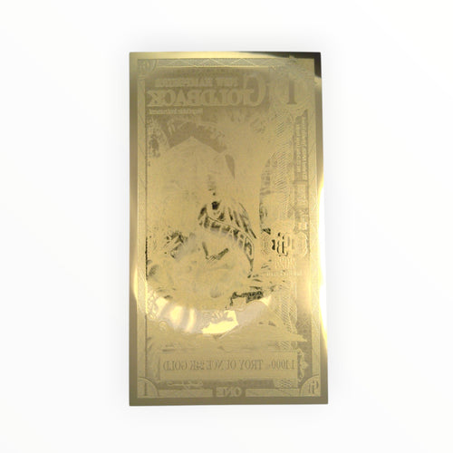 Back of a 1 New Hampshire Goldback showing the official reverse design and 24-karat gold foil construction.
