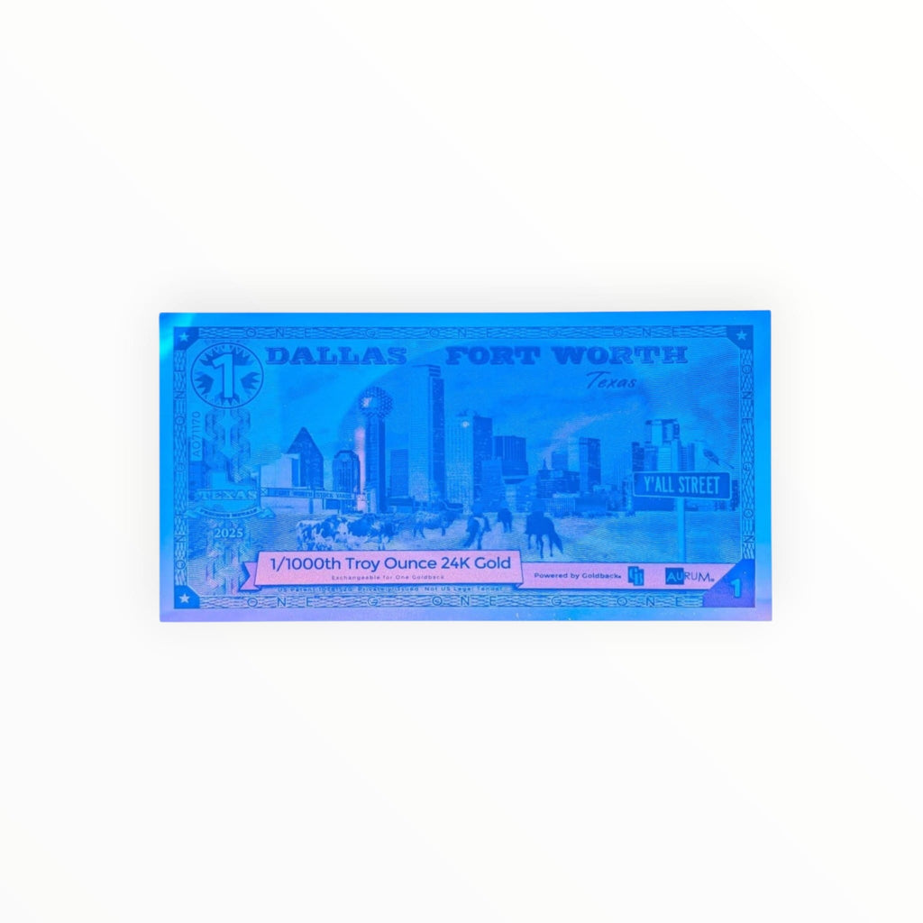 Blacklight on a Dallas Fort Worth 1 Goldback on a black cloth
