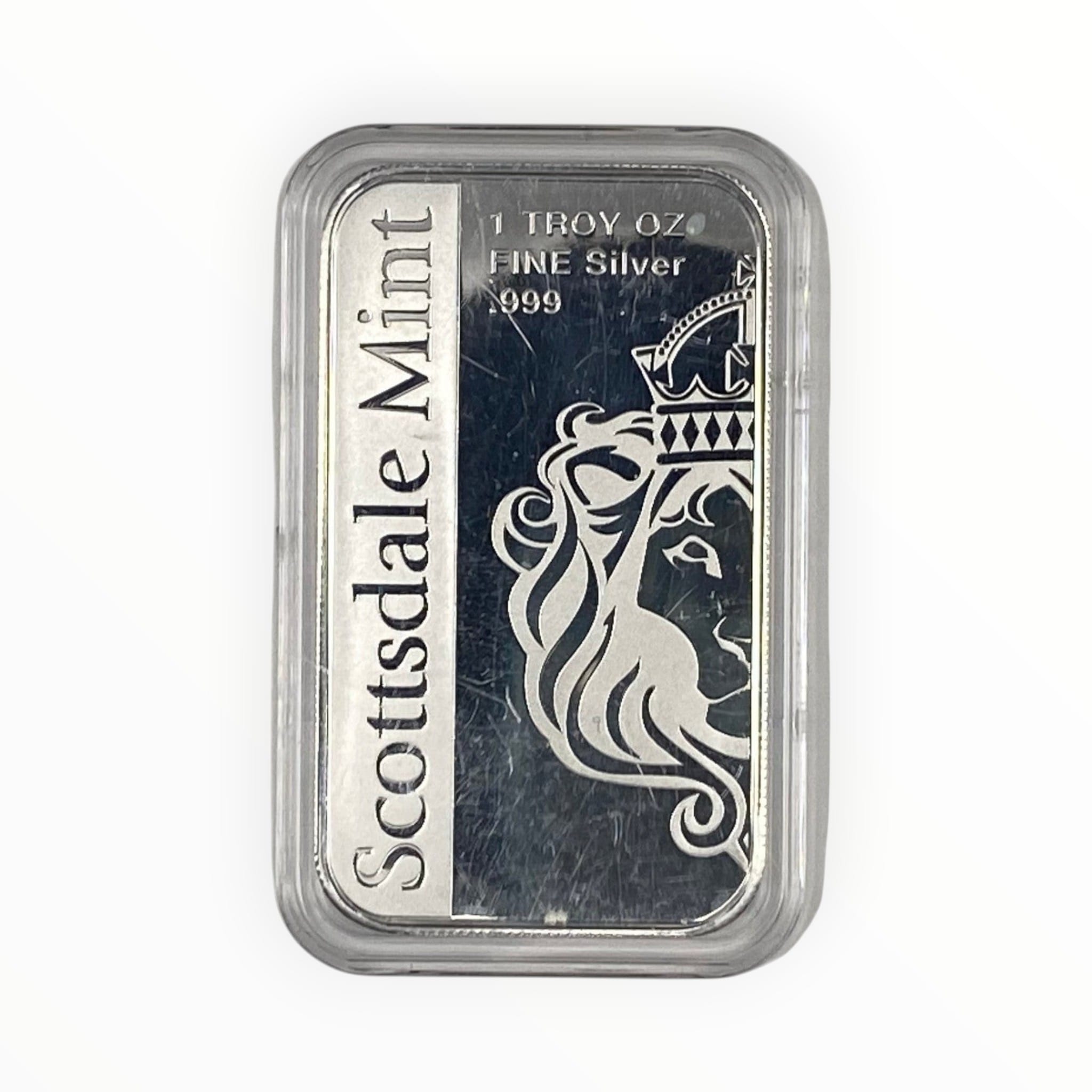 A silver bar in a clear plastic protective capsule, featuring the Scottsdale Mint logo and a crowned lion design on a white and dark background.