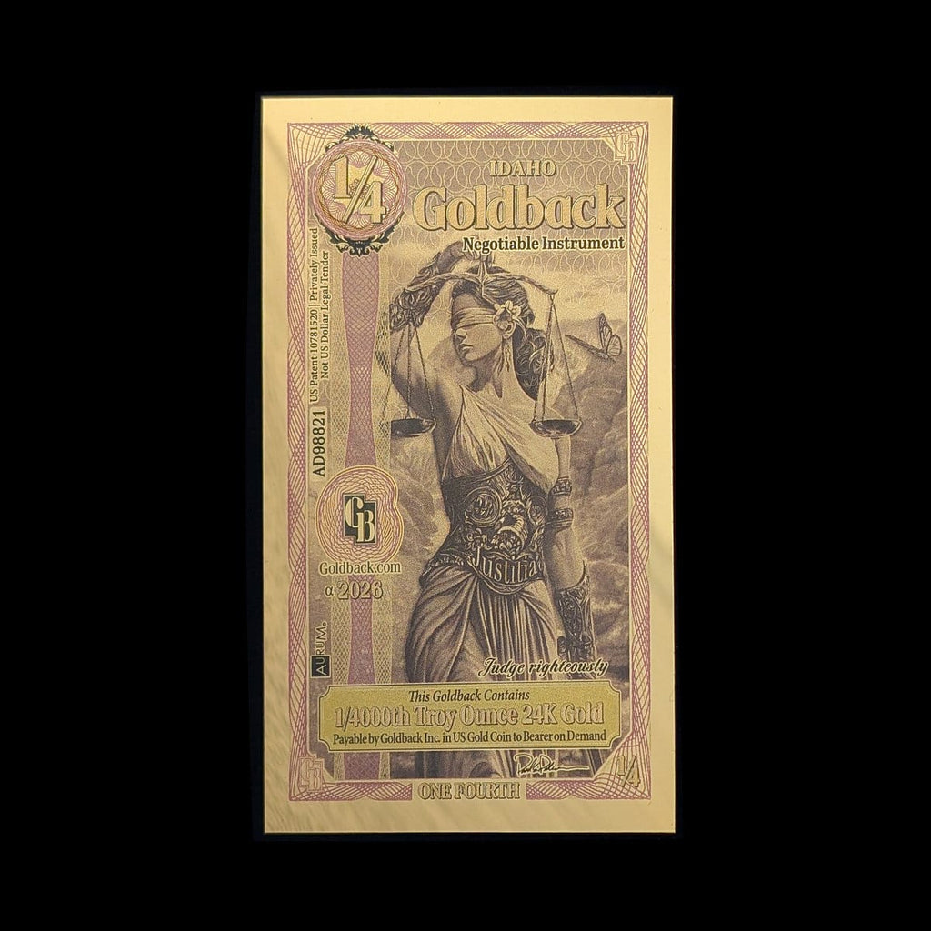 Goldback Idaho negotiable instrument with a woman holding scales on a black background