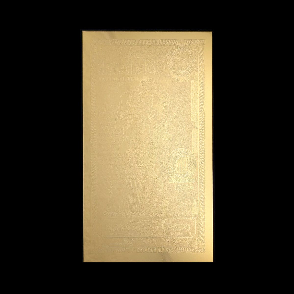 Back of a ¼ Idaho Goldback gold note showing the reverse design and security features